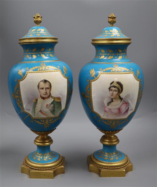 A pair of Sevres style Napoleon & Josephine bleu celeste vases and covers, late 19th century height 41cm